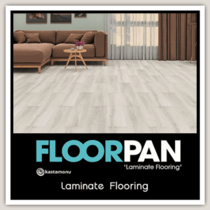 Floorpan laminate flooring in modern living room with brown couch – premium grey wood finish by Kastamonu