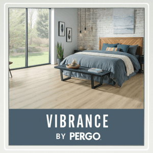 Vibrance by Pergo laminate flooring in a bright modern bedroom with light wood tones and elegant grey décor.