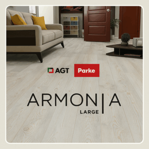 AGT Armonia Large – 8 mm AC4 wide plank laminate flooring with 4-V bevel installed in a modern living room