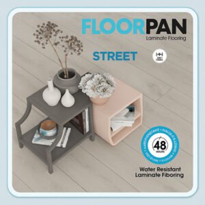 Floorpan Street wide plank laminate flooring with side tables, vases, and books on water-resistant wood-look surface